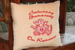 Embroidered cushion with I love you design