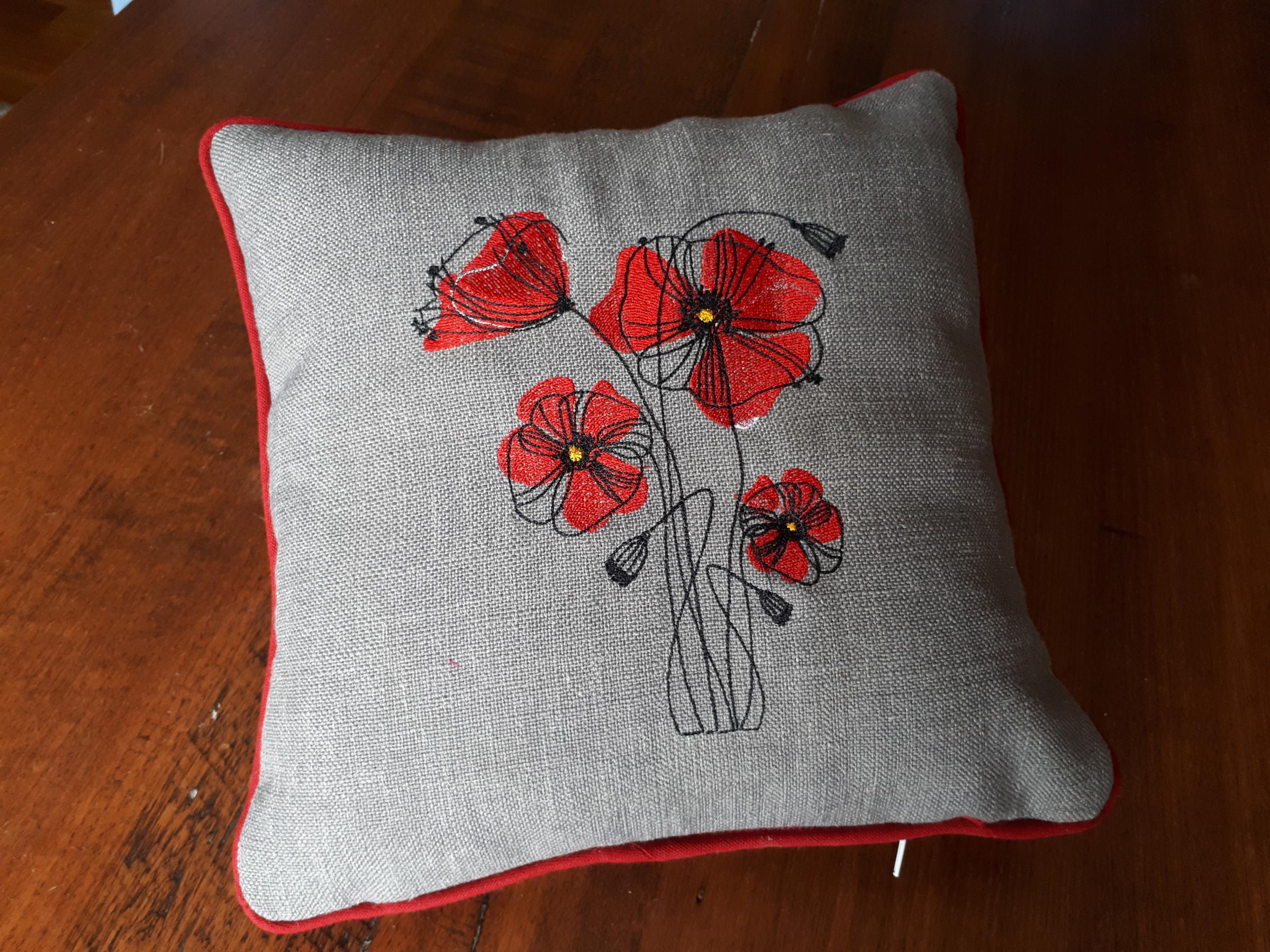 Poppie free embroidery design cushion