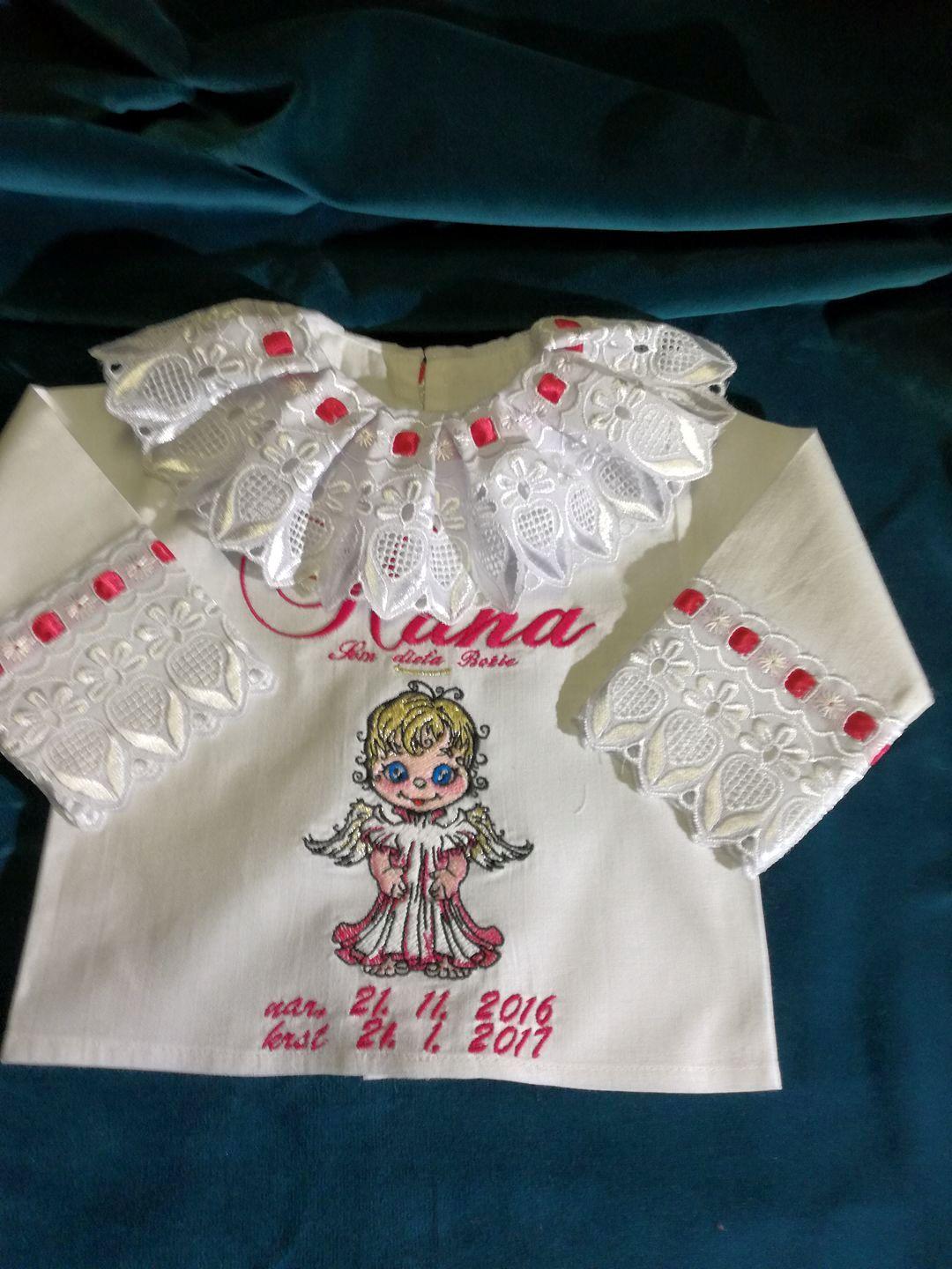 Embroidered christening dress with cute angel design