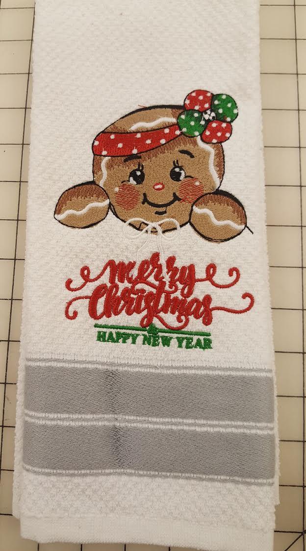 Embroidered towel with American gingerbread design