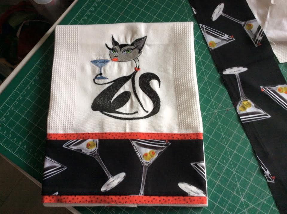 Embroidered towel with glamour cat design