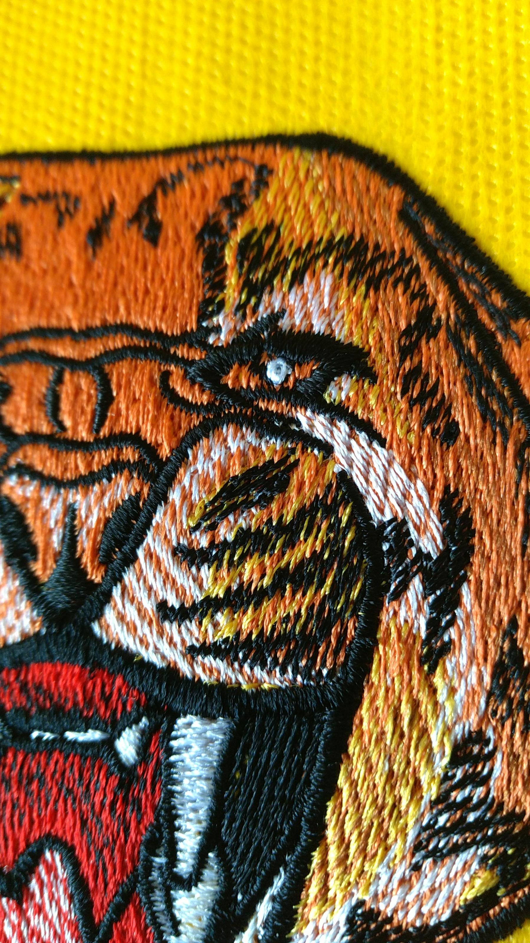 Fragment of wild cheetah embroidery design