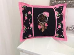 Embroidered cushion with romantic dreamcatcher design