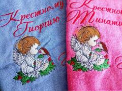 Two embroidered towels with Christmas angel design