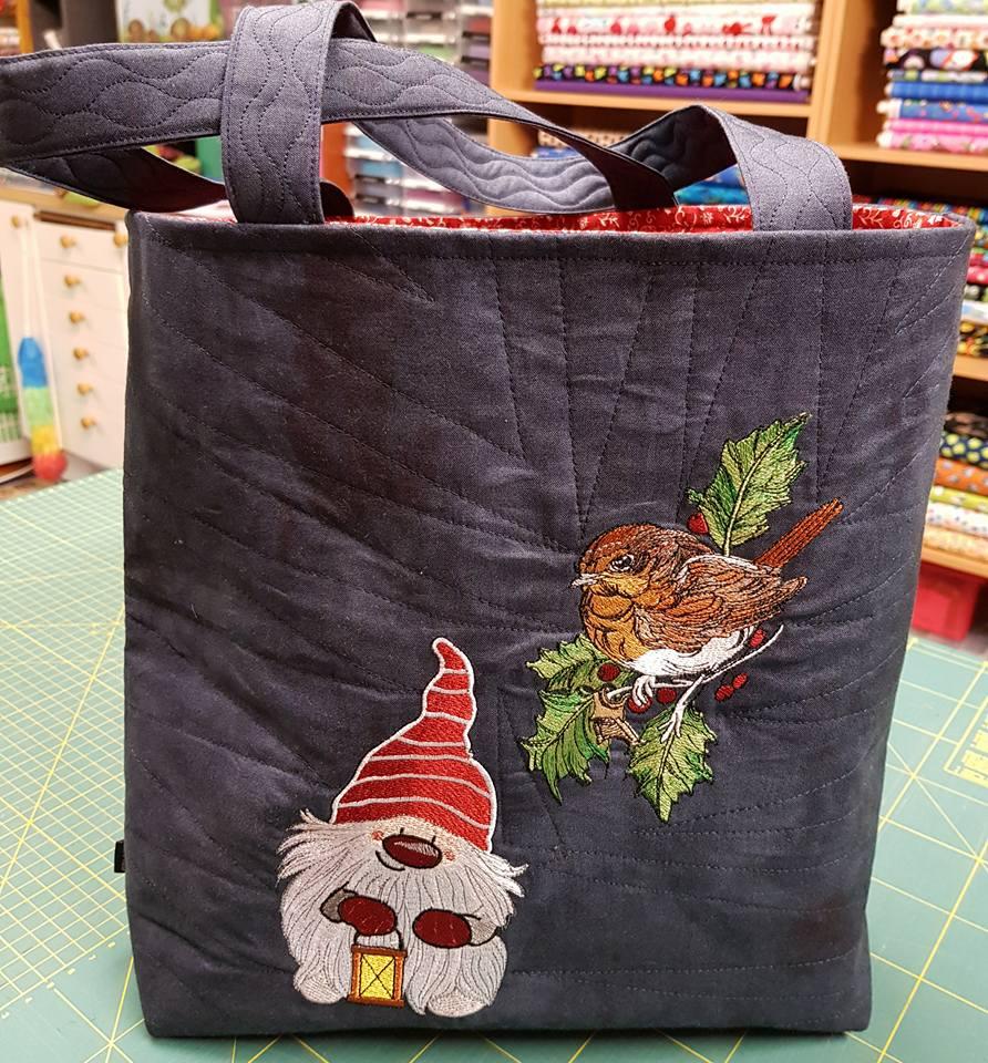 Embroidered bag with Christmas dwarf and winder bird designs