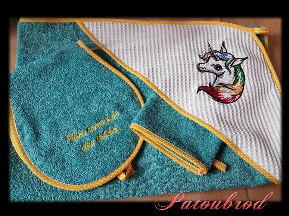 Embroidered newborn set with Colored unicorn design