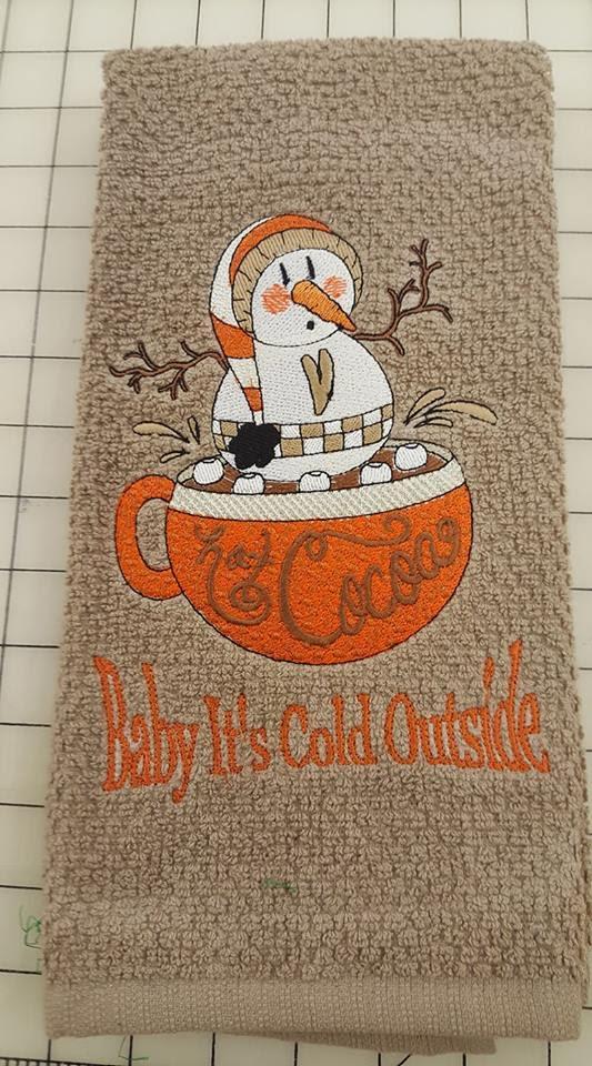 Towel with Snowman in mug embroidery design