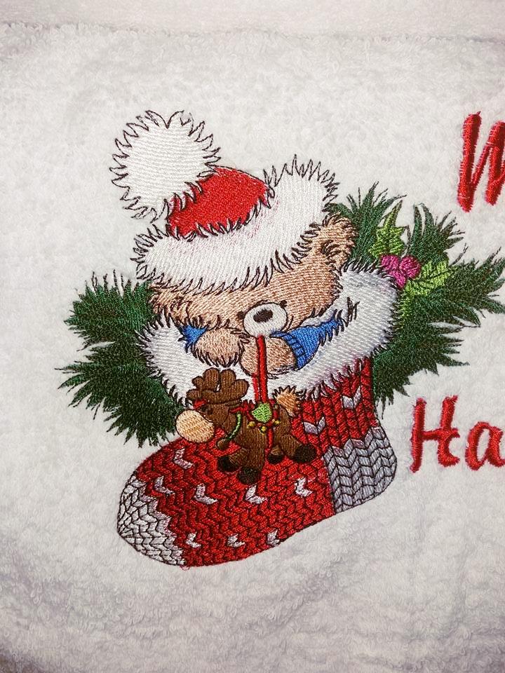 Teddy bear in Christmas sock embroidery design