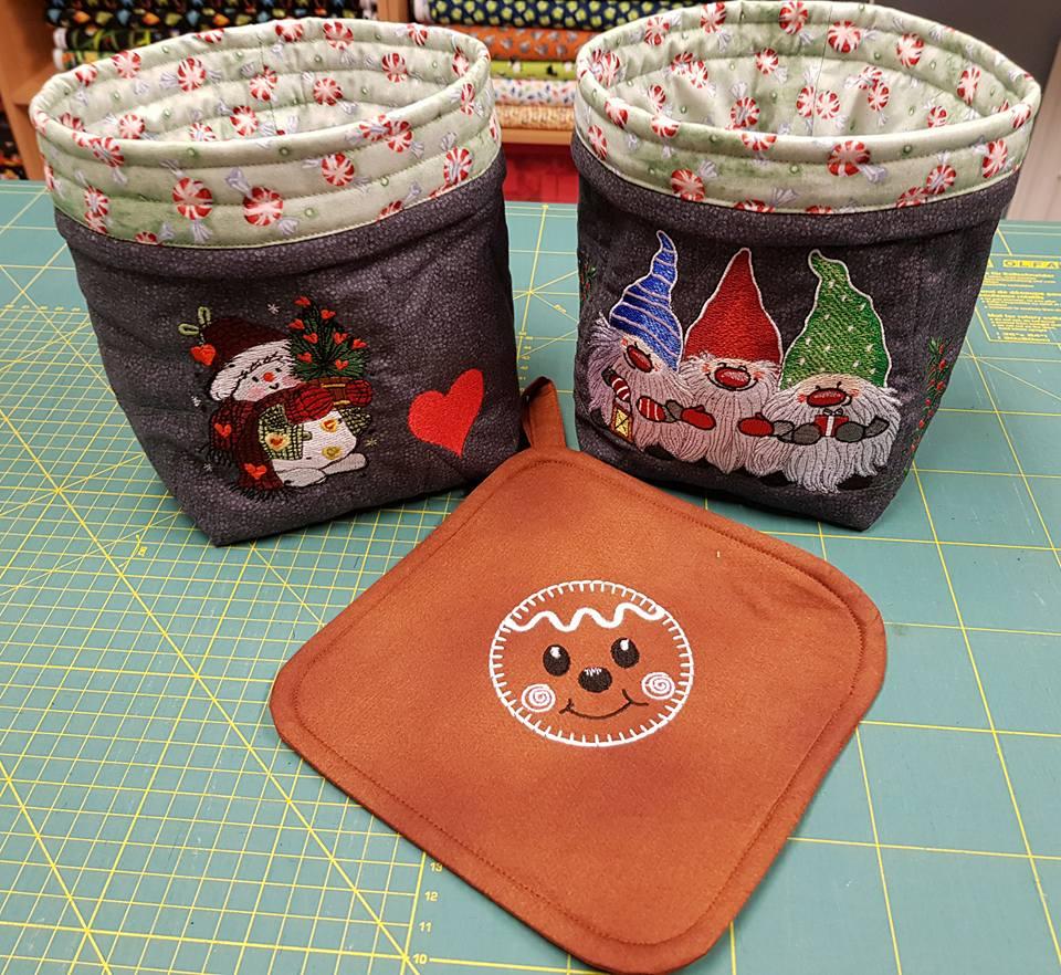 Embroidered Christmas baskets with snowman and dwarves designs