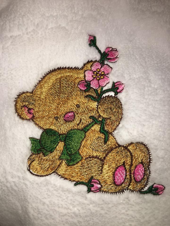 Bear with pink flower embroidery design