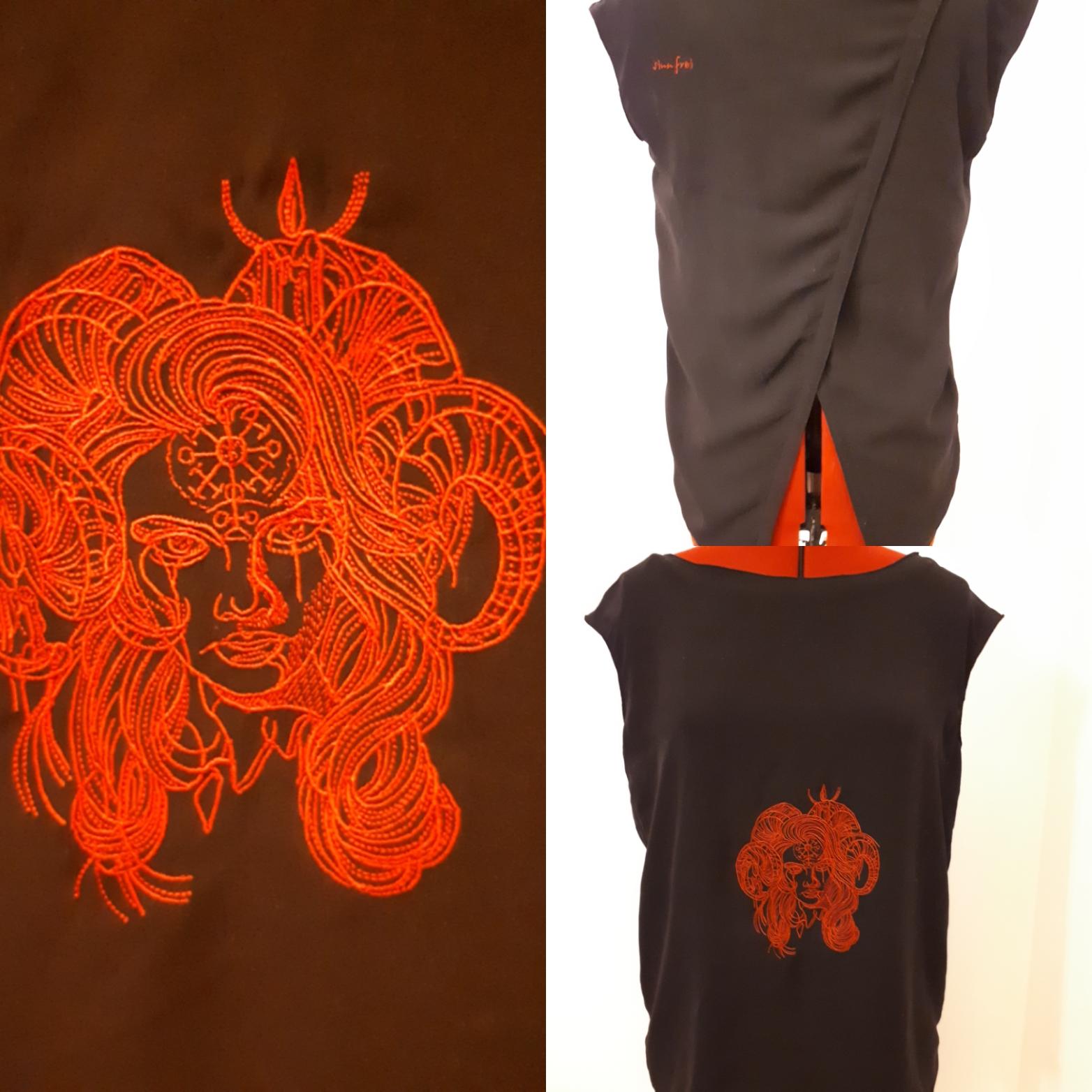 Horny demon with pictograph on forehead embroidery design