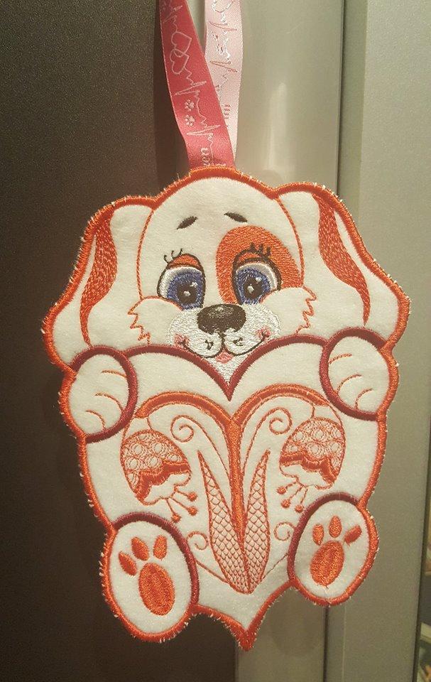 Embroidered applique orange dog on the loop