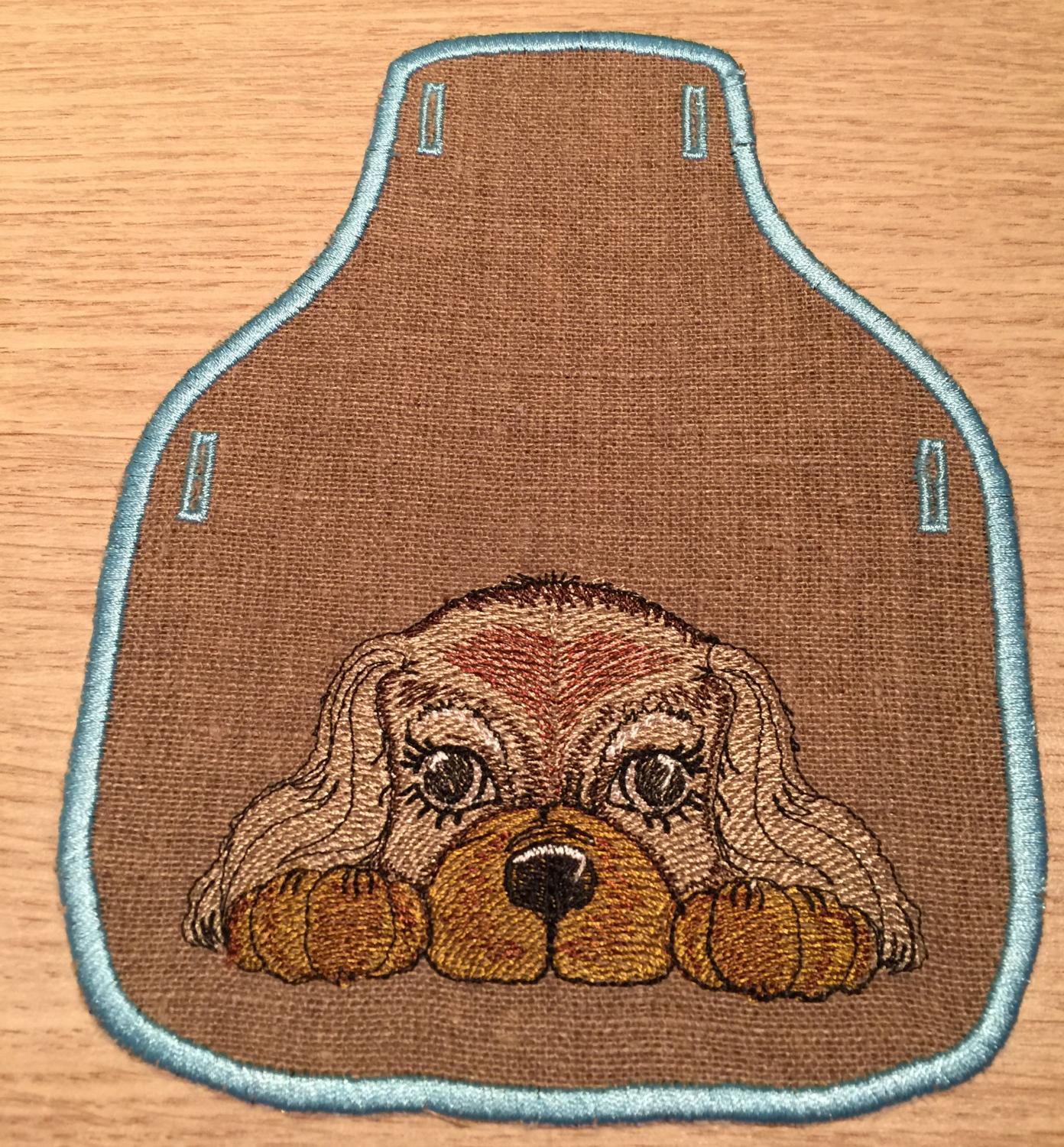 Embroidered kitchen accessory with cute spaniel
