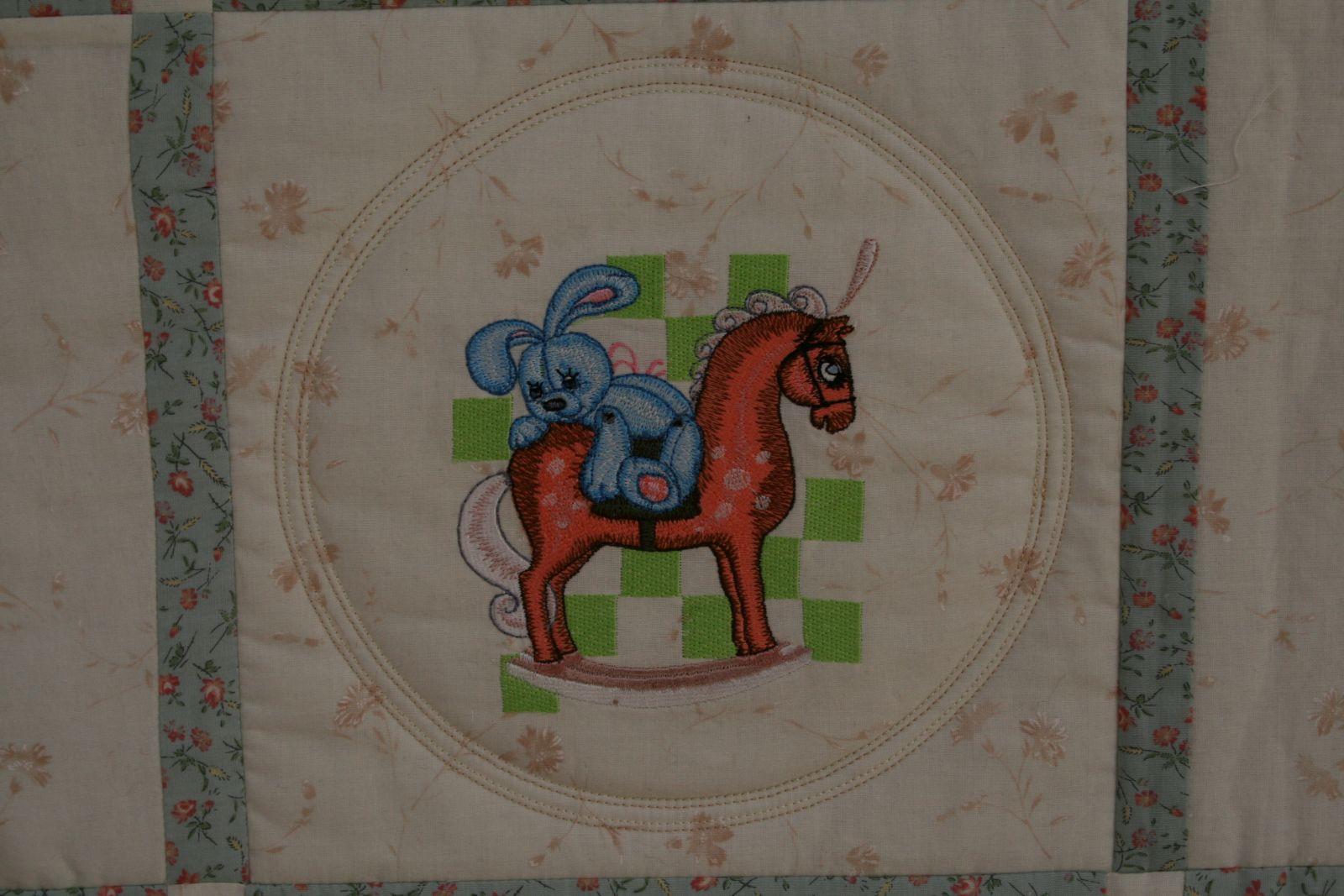 Rabbit in horse embroidery in quilt
