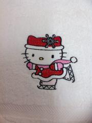 Hello Kitty on skates machine embroidery design