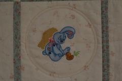 Rabbit embroidered quilt