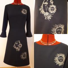 Embroidered dress with Sun and moon design