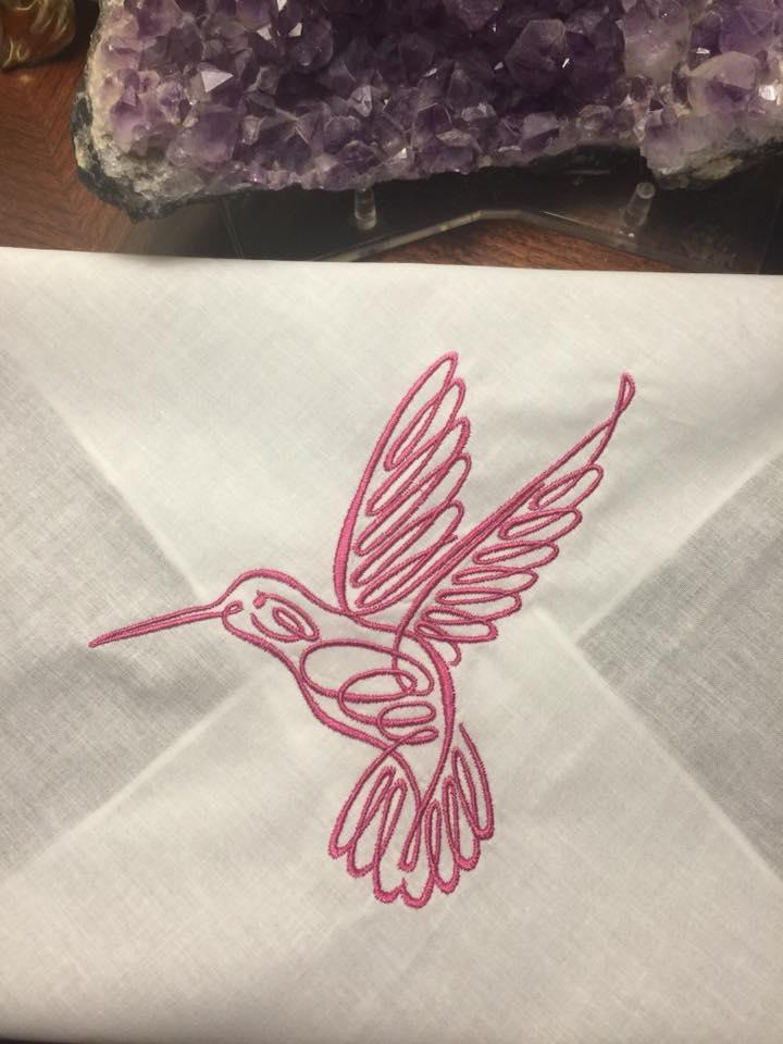 Napkin with Pink bird free embroidery design
