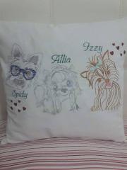 Embroidered pillow with three dogs embroidery designs
