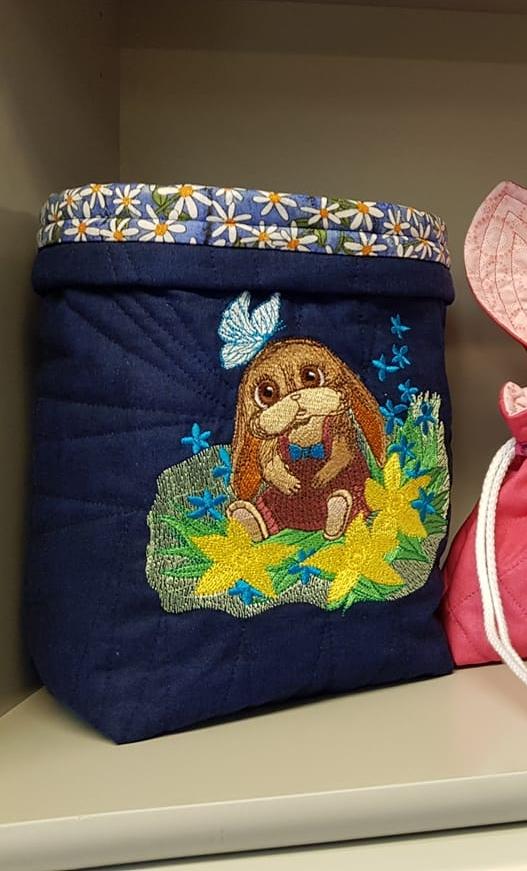 Embroidered basket with funny bunny design