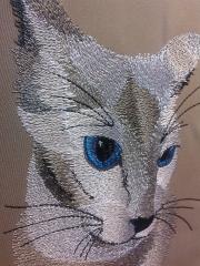 Closeup blue eyes cat free embroidery design