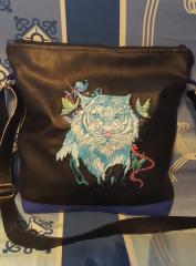 Unconventional: Leather Bag Featuring Wet Tiger Embroidery Design