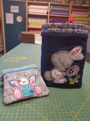 Embroidered cases with bunny and bee designs