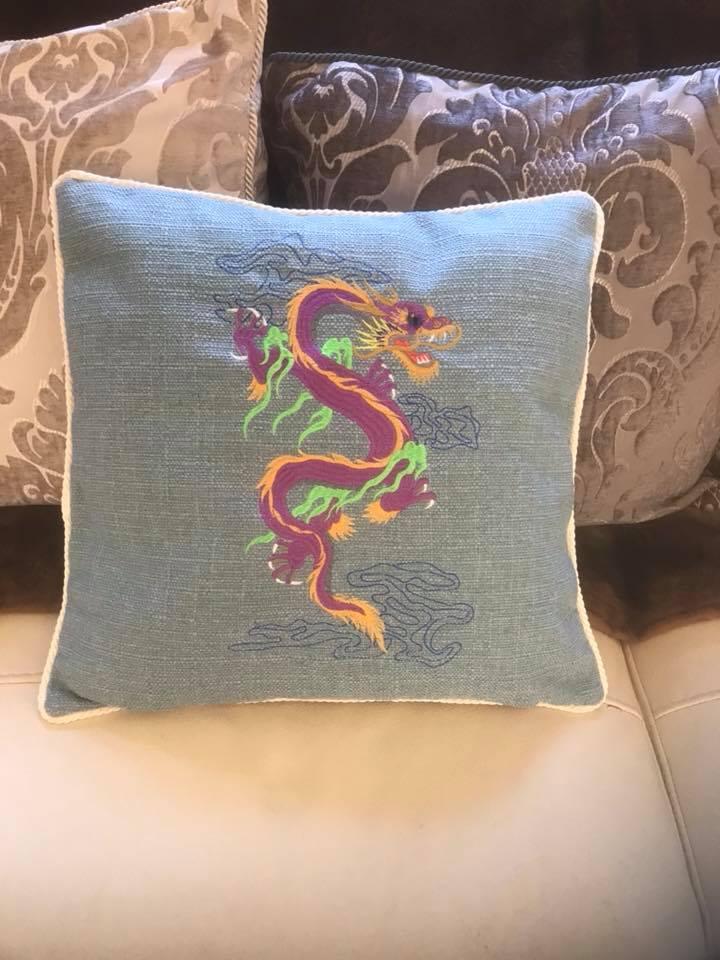 Embroidered cushion with fantastic dragon free design