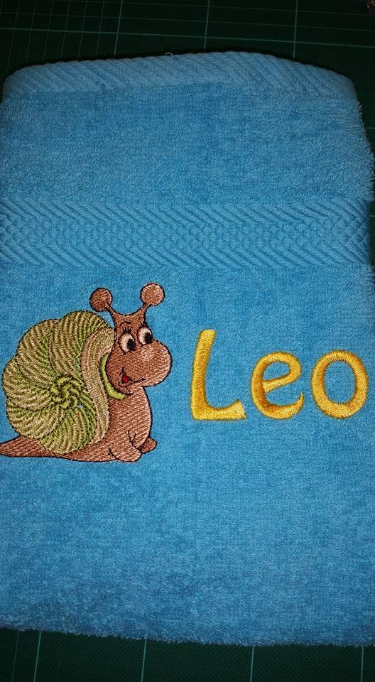 Embroidered towel with little snail free design