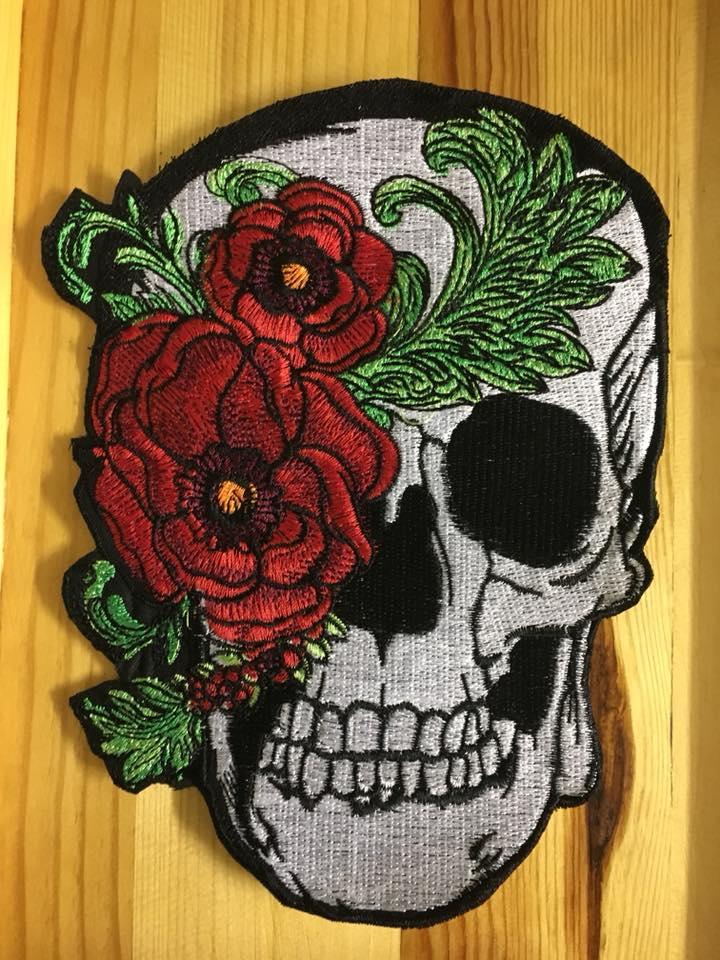 Skull with peony mask close up embroidery design