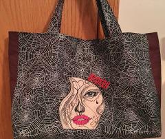 Embrace the Art of Storytelling with the Girl's Tears Embroidered Bag