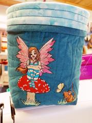 Embroidered basket sad fairy design