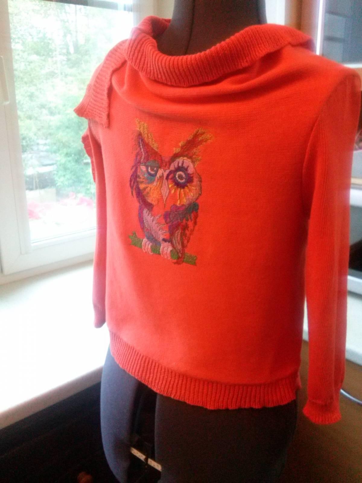 Colored owl on a sweater machine embroidery design