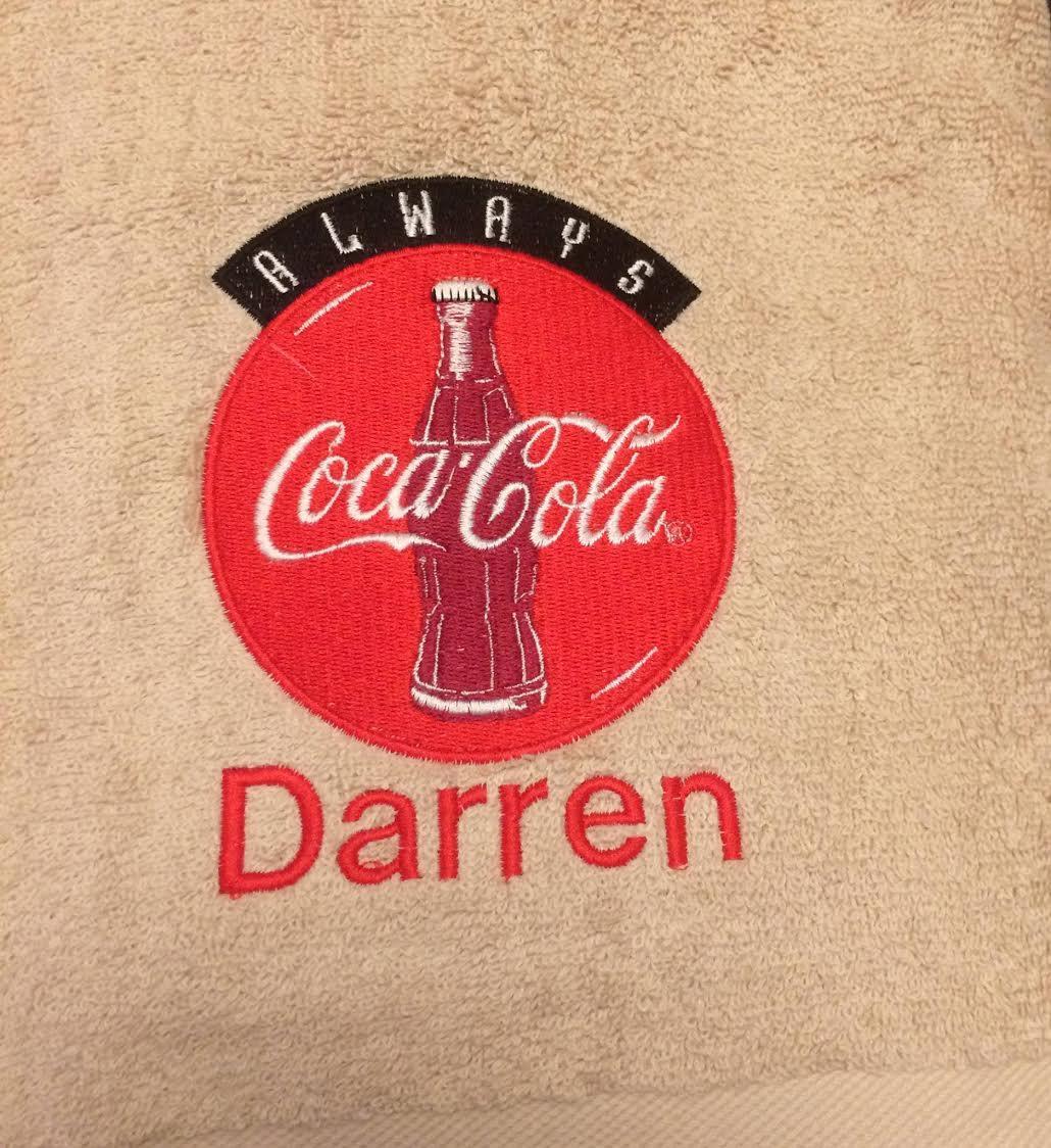 Embroidered towel with Coca-Cola