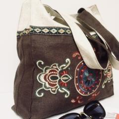 Elegant Embroidered Bag with Floral Ornament Design