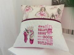 Embroidered cushion with pink pointes design