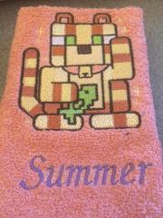 Embroidered towel with stylized cat