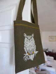 Express Your Style with a Textile Bag Featuring a Tribal Owl Design