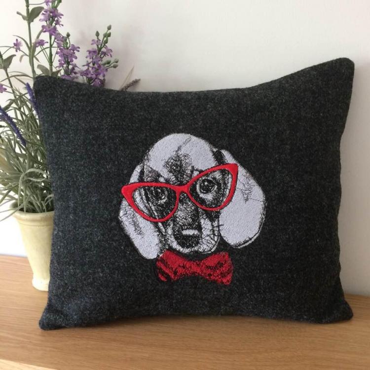 Embroidered cushion with dog free design