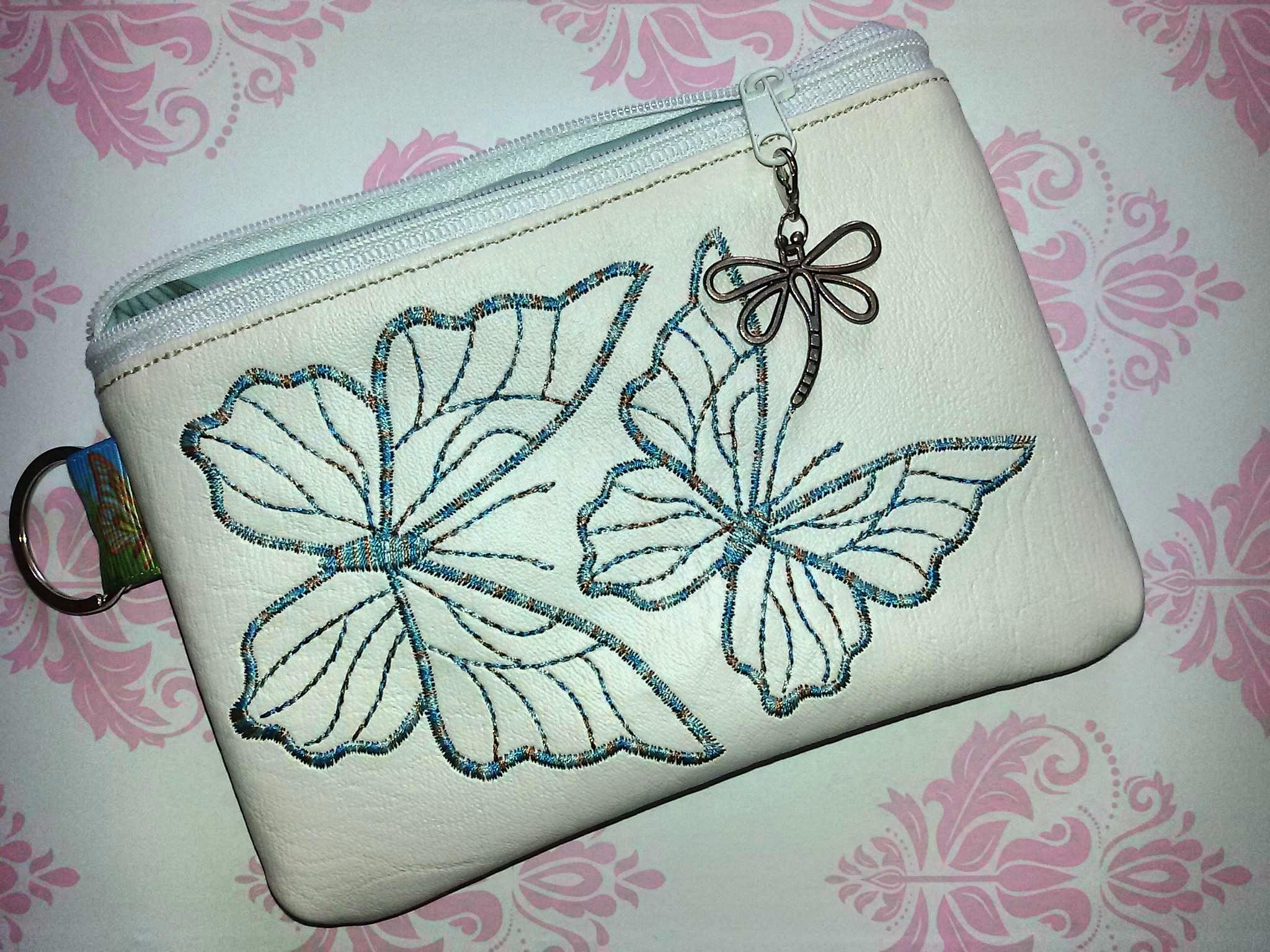 Handbag with Blue butterfies embroidery design