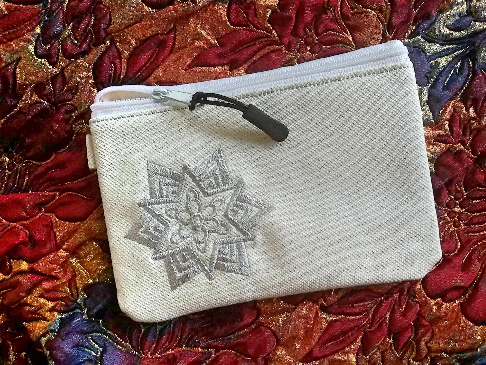 Elevate Your Winter Look with Snowflake Embroidery Design Purse