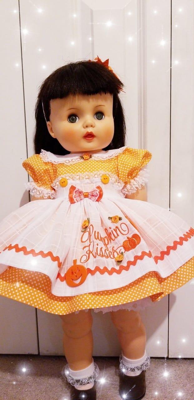 Embroidered doll's dress with Pumpkin kisses design