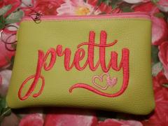 Show Creativity with Handbag Featuring Pretty Free Embroidery Design