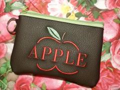 Striking Handbag Adorned with Apple Symbol Embroidery Design