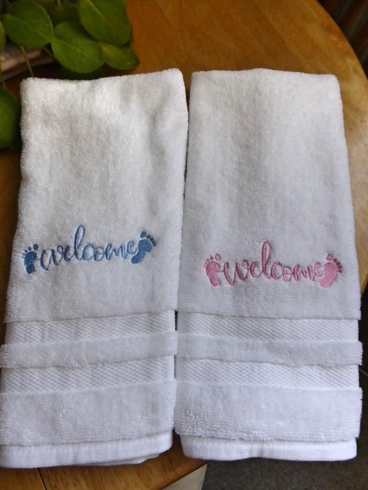 Set of embroidered towels with Welcome baby free design