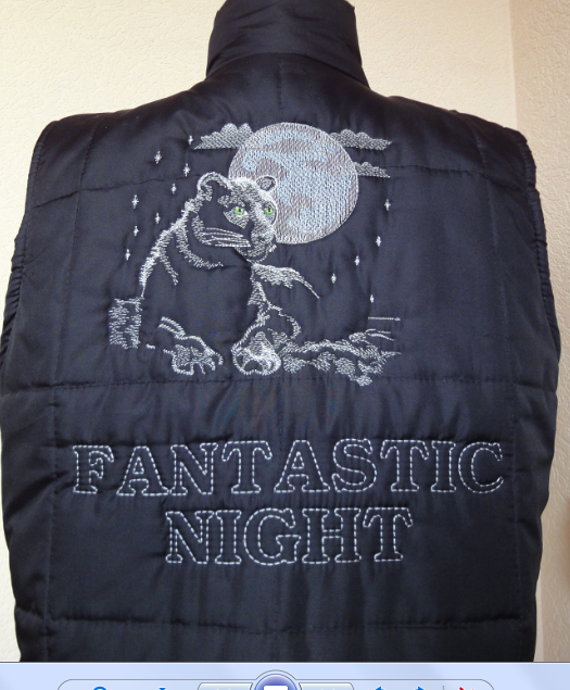 Winter jacket with panther free embroidery design