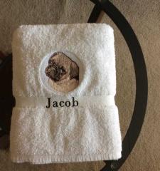Embroidered towel with Pug dog free design