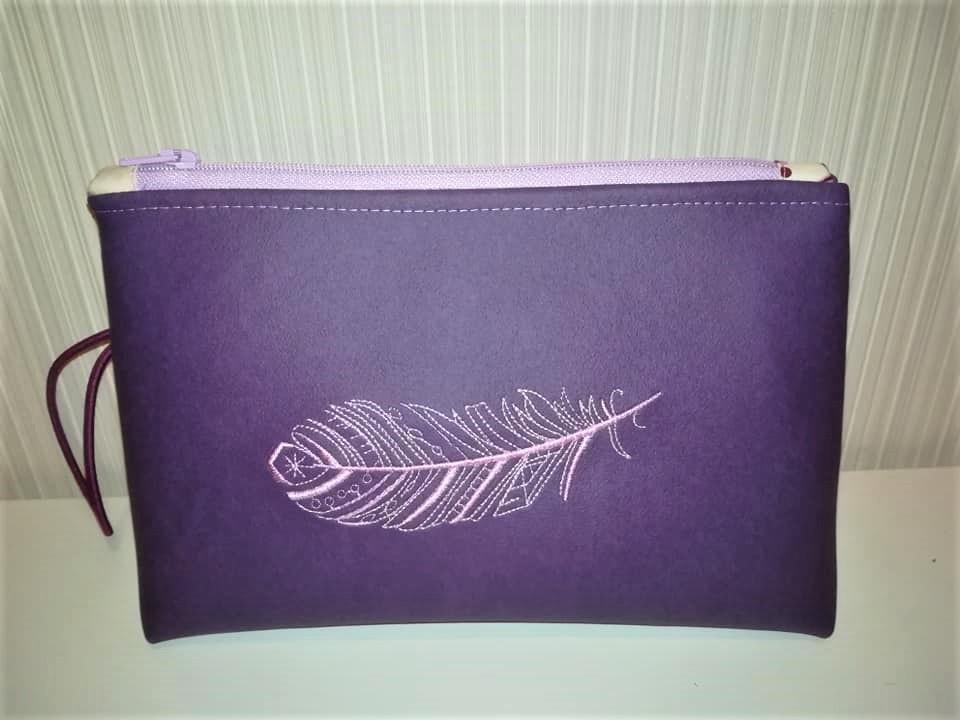 Embroidered handbag with Feather design