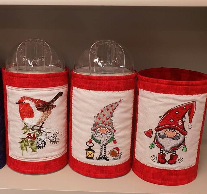 Embroidered textile boxes with Christmas designs