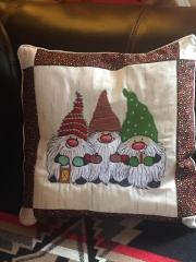 Embroidered cushion with Three dwarves design